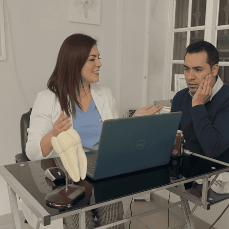 Dentist Dra Daisy Osuna consulting with patient about emergency dental care in Mazatlan.